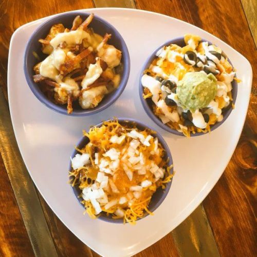 Happy Hour Tot Sampler Happy Hour Tot Sampler: Nacho Tots, Chili Cheese Tots, Bacon Gorgonzola Tots